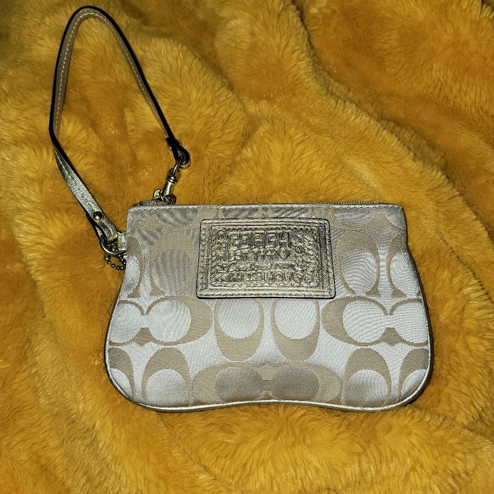 Coach Poppy wristlet gold lavender